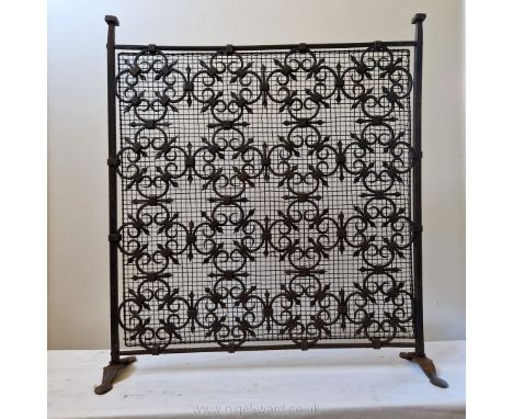 A very attractive vintage wrought iron fire screen in the French Louis XIV style, 25 1/2'' wide x 28'' high.
