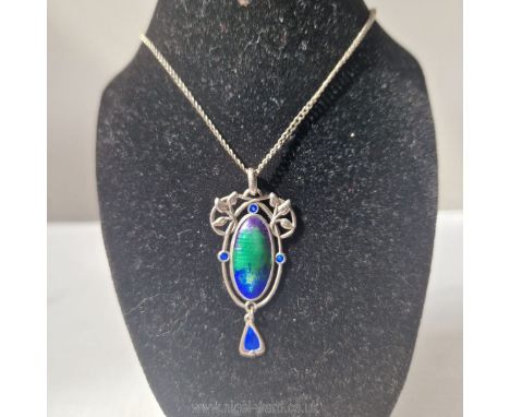 Charles Horner: a good circa 1900 art nouveau sterling silver pendant on chain, of oval form beneath a foliate crest, marked 