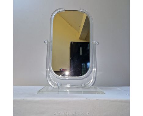 An American art deco lucite make up mirror c. 1920's-30's; 14 ins wide x 22 ins high.