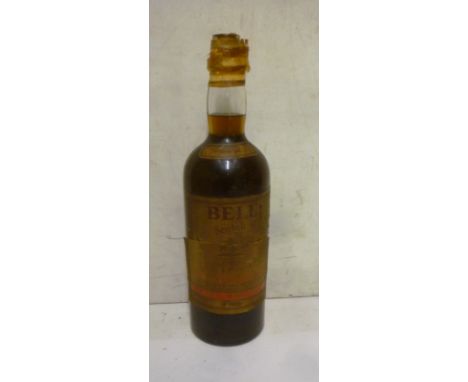 An eight pints (one gallon) bottle of Bells Old Scotch Whisky, purchased 60 years ago, level good, seal good, foil poor, labe