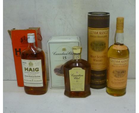 One bottle Glenmorangie 10 year old Single Highland Malt, one bottle Canadian Club 15 year old, one bottle Haig Blended Scotc