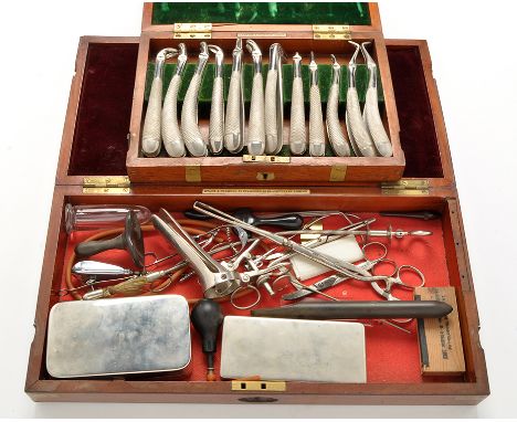 An early 20th Century surgeon's set of instruments, in lacquered brass-bound mahogany case, inscribed 'S.R. Alexander', by Ma