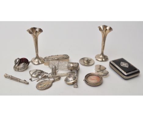 A miscellaneous related items, comprising: tortoiseshell and white metal purse; pair of Edwardian silver posy vases; a Mexica