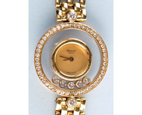 Chopard: a lady's 'Happy Diamonds Wristwatch', the circular gold coloured dial without numbers, signed Chopard Geneve, border