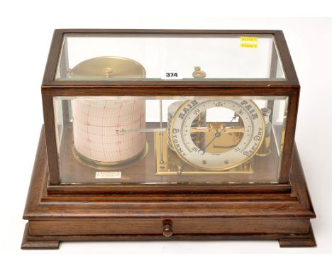 An early 20th Century barograph, by D. McGreggor & Co. Ltd., Glasgow, fitted with barometer dial, in glazed oak case, 14 x 9 