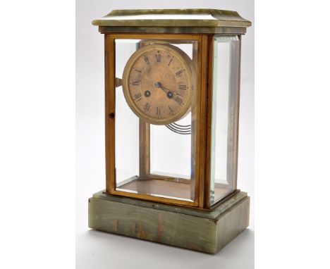 A French four glass mantel clock, with 4in. gilt dial, roman numerals and inscribed 'Gowland, Sunderland', striking on a sing