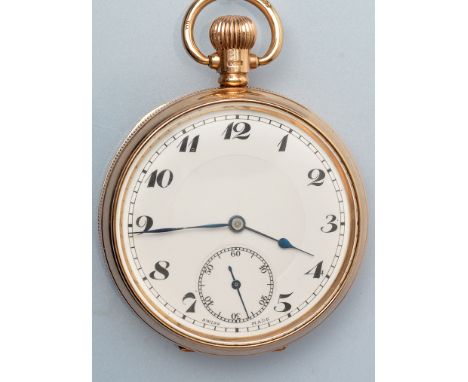 A 9ct. gold crown wind open faced pocket watch, with white enamelled arabic dial, subsidiary seconds dial, engine turned case