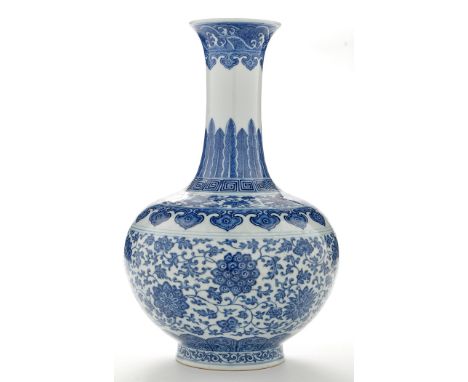 Chinese Ming-style blue and white vase, the body of bulbous form with central band of composite flower scrolls, rising to two