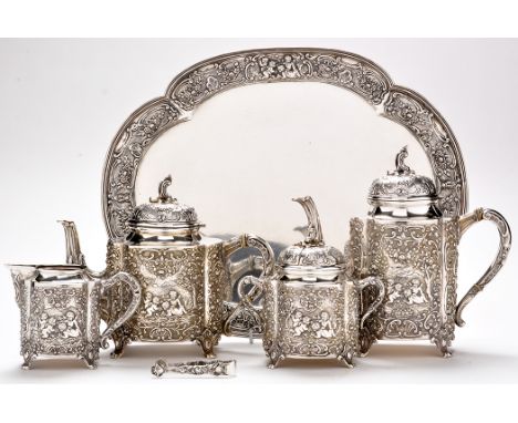 A late 19th Century German silver tea and coffee service, to include: coffee pot, teapot, covered two-handled sugar bowl, mil