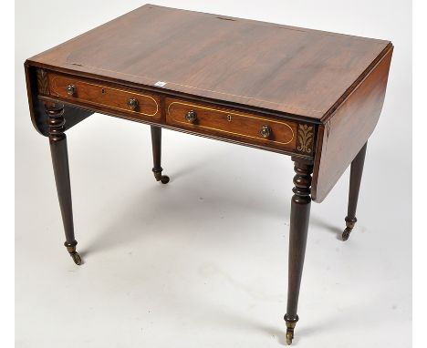 A Regency rosewood sofa table, with inlaid brass stringing and floral motifs, fitted two single drawers opposite dummy drawer