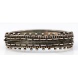 A Victorian silver hinged bangle, Birmingham 1890, 57 x 48 x 11mm, 22gm