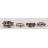 Four silver buckle rings, N - S, 14gm