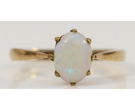 A 9ct gold opal claw set ring, London 1981, K 1/2, 1.2g