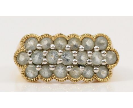 A 9ct gold and aquamarine dress ring, K 1/2, 3g