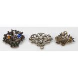 A 925 silver and paste basket of flowers brooch, and two 800 standard silver brooches, 16gm