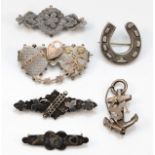 Six Victorian silver sweetheart brooches, including a Mizpah double heart, Birmingham 1900, 17gm