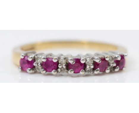 A 9ct gold ruby and diamond ring, K 1/2, 2.1gm
