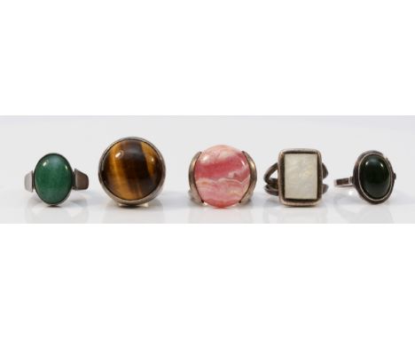 A silver and tigers eye dress ring, K 1/2 and four other silver and stone set rings, 30gm