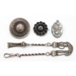A Victorian silver albertina, a Victorian silver tennis locket, Birmingham 1894 and two Victorian