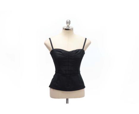 A DOLCE &amp; GABBANA STRAPLESS CORSET TOP
Peplum style to the waistline, with bandeau top and leopard print lined interior

