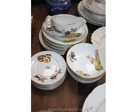 A Royal Worcester 'Evesham' part Dinner Service including eight dinner plates, six tea plates, six breakfast bowls and a grav