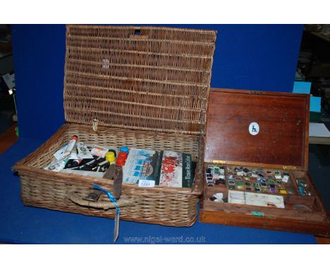 A wicker hamper containing Artist's paints, Winsor & Newton inks, etc