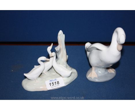 A Nao ornament of three ducks and a Nao figure of a Duck