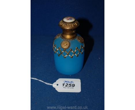 A blue glass Scent Bottle with enamel top