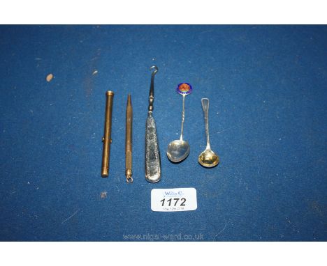A pen and pencil set, a silver button hook, a mustard spoon and a souvenir spoon