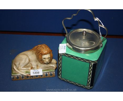 An Art Deco Gray & Co. Ltd;  green and black Tea Caddy together with a 19th c. Staffordshire pottery Lion