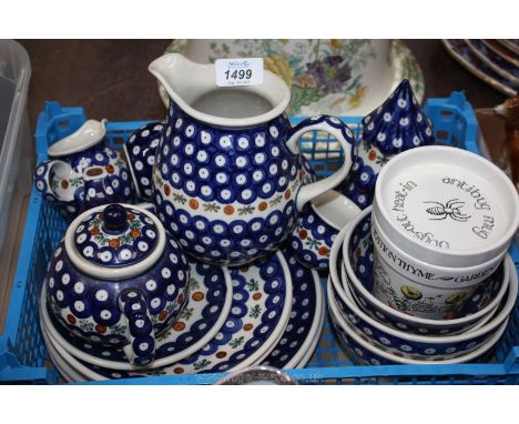A quantity of Polish blue pattern part Dinner/Tea service including coffee cup and saucer, teacup and saucer, teapot, two jug