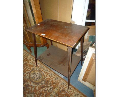 An Edwardian Mahogany Occasional Table with Stretcher Shelf on Delicate tapering legs.