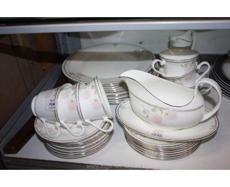 A Royal Doulton 'Twilight Rose' pattern part Dinner and Tea Service including dinner plates, gravy boat and saucer, six cups 