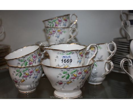A Royal Staffordshire six setting Tea Service with floral design and gilt rim
