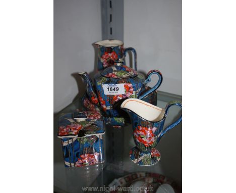 A Royal Winton Grimwades bold blue chintz design part Teaset including teapot, water jug, sucrier, milk jug and twin handled 