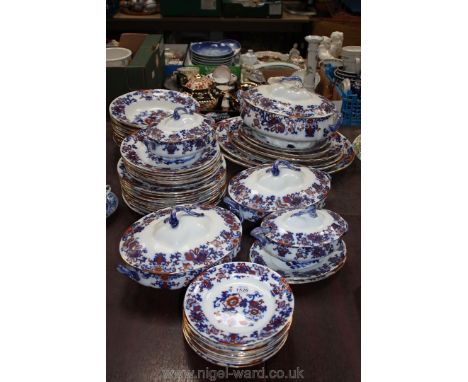 A Royal Doulton 'Nankin' Dinner Service including eleven of each; dinner, tea plates, twelve soup bowls, seven breakfast plat