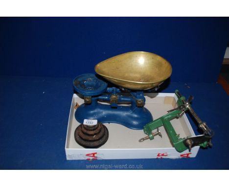 A set of Victor Scales with weights together with a vintage apple Corer
