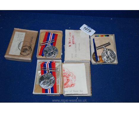 A quantity of family related items including a boxed WWI pair to; 23966 Pte. A.T. Cooper, Durham L. I. with dog tags in box o