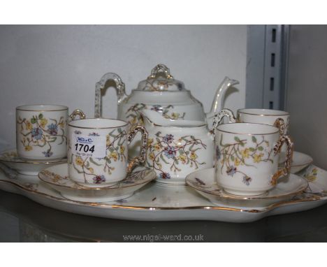 A Limoges for G. D. & Co; part Tea Service for four people with tray in yellow floral pattern