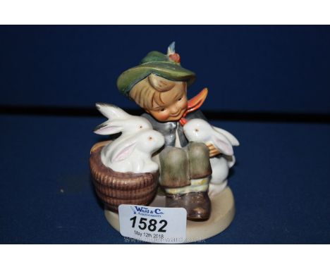 A Goebel Hummel figure 58/0 'Playmates' boy with rabbits