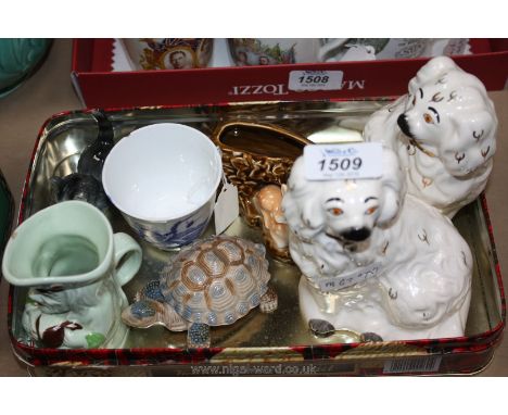 A quantity of china including a pair of Beswick mantle dogs, Goebel kitten, Wade tortoise, Toby jug, etc