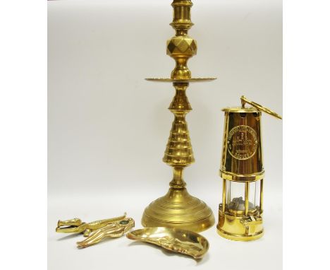 Brassware - an Eccles no 6 miner's safety lamp; a candle stick;nut cracker; man in the moon pin tray 