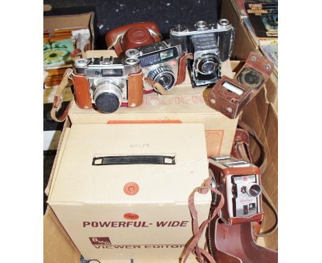 Photography interest - a Kodak Compur bellows camera; a Braun Paxette 35mm camera; another Braun Paxette Ennagon; a Kodak Bro