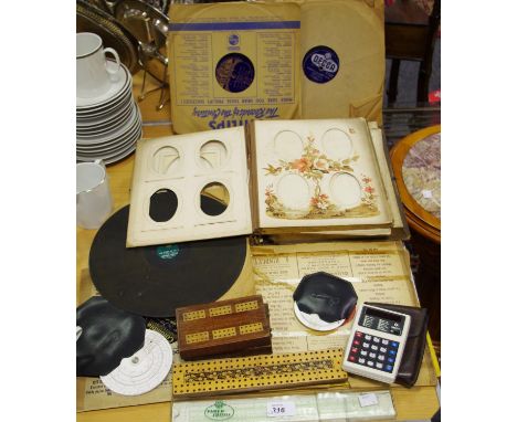 A musical photograph album; a Tunbridge type marquetry inlaid cribbage board; 78s records including one single sided; a CBM c