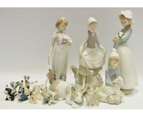 Lladro - a playful cat model ' Play with Me ' pattern number 5112, boxed; boy holding a sheep; Nao figure of a girl holding a