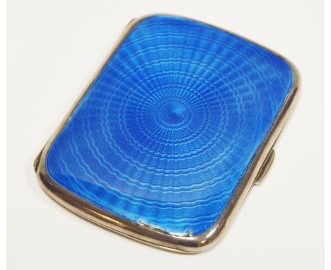 A silver and guilloché enamel cigarette case, hinged cover and verso engine turned and decorated in tones of blue, gilt inter