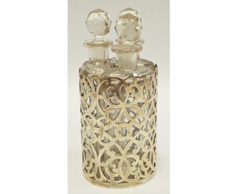 An early 20th century silver three section scent flask suite, pierced decoration hallmarked 1905