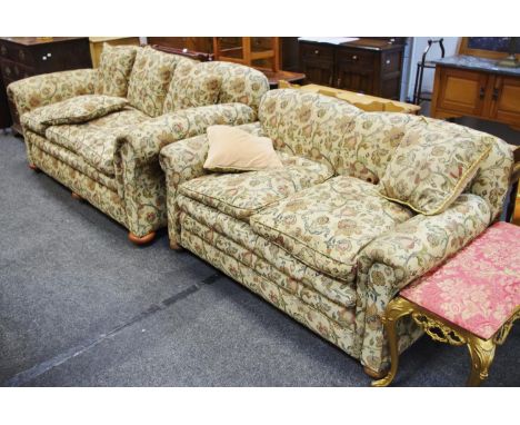 A 1930/40's drop arm two seat sofa; a conforming three seat sofa (2)