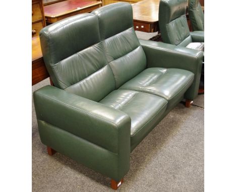 An Ekornes Stressless reclining two seat sofa.