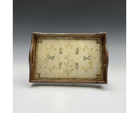A late 19th/early 20th century silk panel, embroidered with the name 'Francis', floral garlands and beadwork bows, inset into